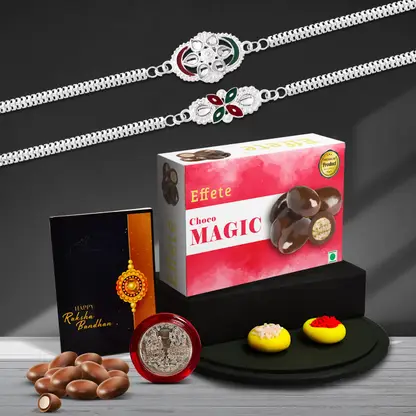 Rakhi Gift Combo With 2 Elegant Rakhis For Brother Includes Choco Magic Box Silver Coin Roli Chawal Greeting Card