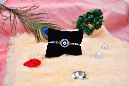 Evil Eye Rakhi With Blue Beads And Golden Accents Protective Nazar Design