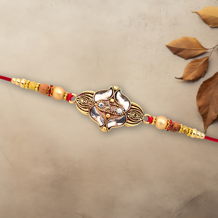 Elegant Floral Designer Rakhi With Gold-toned Beads Red Thread