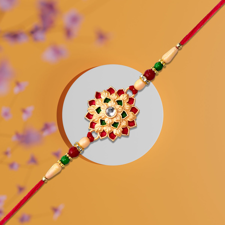 Designer Floral Rakhi With Beaded Strap Red Green Gold Accents
