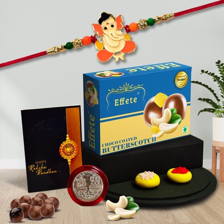 (K1_255_bs32) Multicolor Orange Rakhi  Bracelet With Chocolate Butter Scotch 32gm Silver Color Pooja Coin Roli Chawal  Greeting Card Rakhi For Brother With Gift  Handmade Rakhi Rakhi Combo For Brother  Stylish Rakhi For Brother  Set
